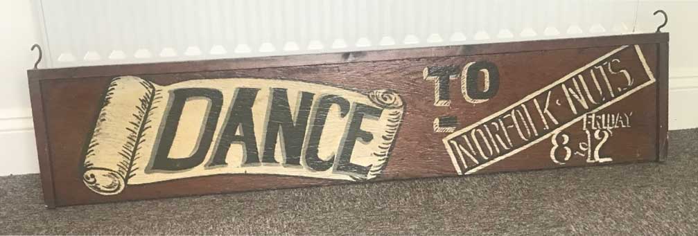 'Dance to the Norfolk Nuts' wooden advertising board