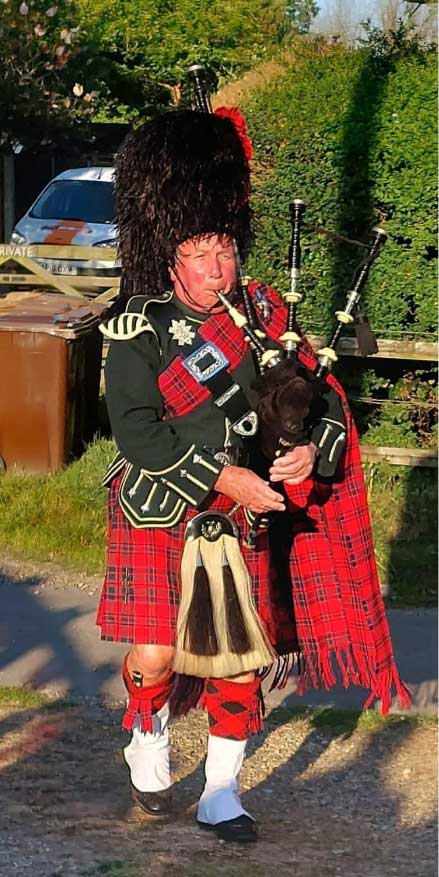 Piper in full regalia at the opening of the new hall in 2022